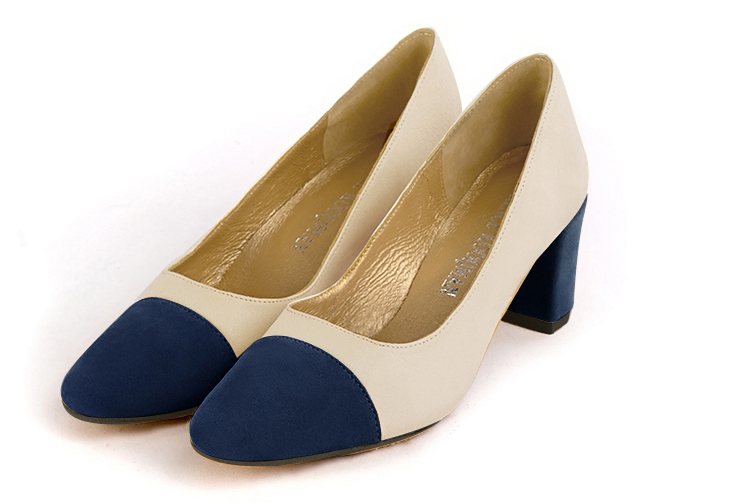 Navy blue and champagne white women's dress pumps,with a square neckline. Round toe. Medium block heels. Front view - Florence KOOIJMAN
